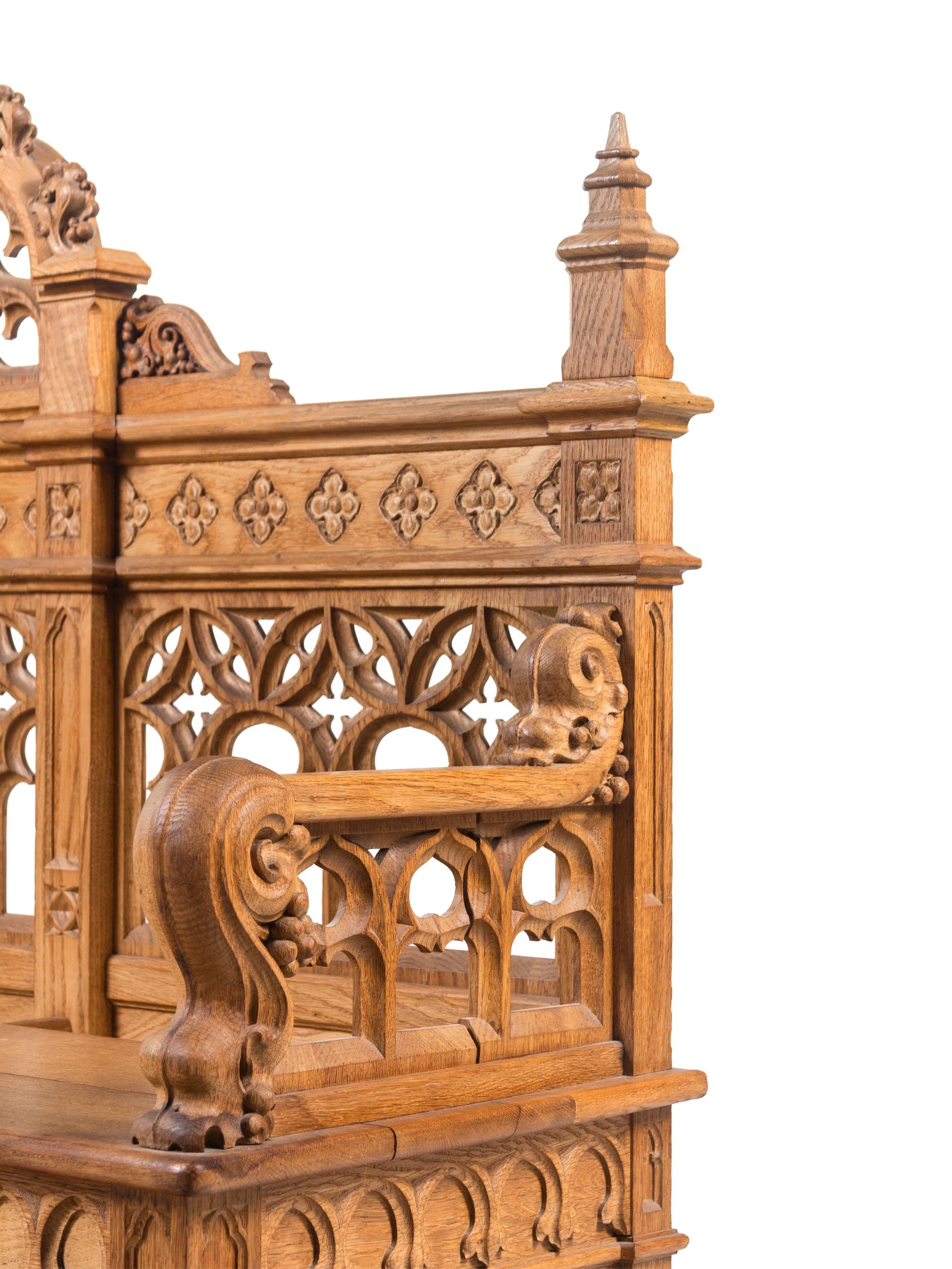 A Gothic Revival Carved Oak Hall Bench
