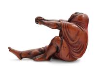 A Carved Wood Figure of Devil