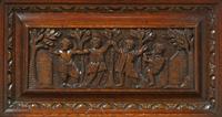 A Renaissance Revival Carved Oak Cellarette