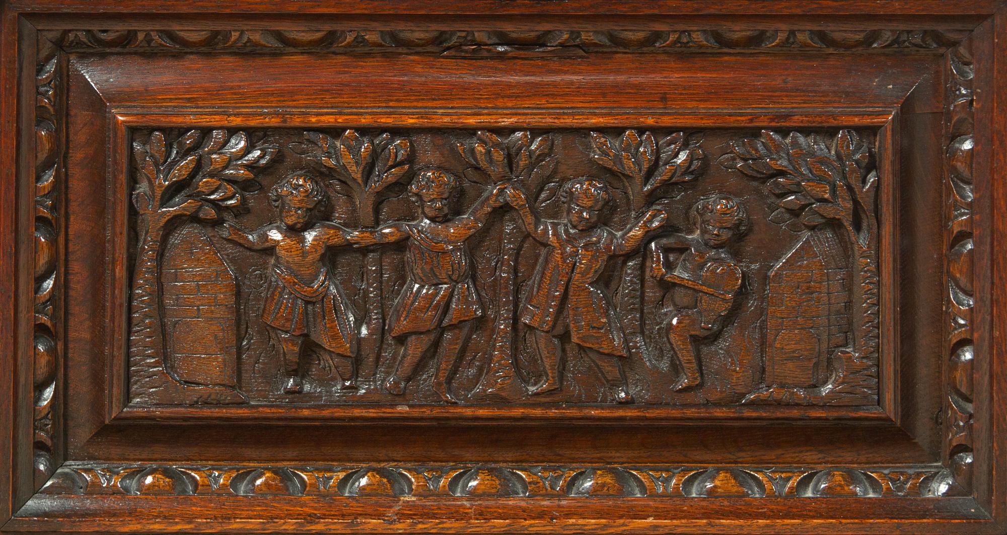 A Renaissance Revival Carved Oak Cellarette