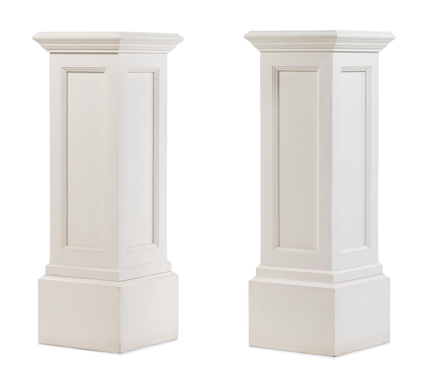 A Pair of White Painted Pedestals Height 39 1/4 x width 13 3/4 x depth 13 3/4 inches. — 20TH CENTURY
