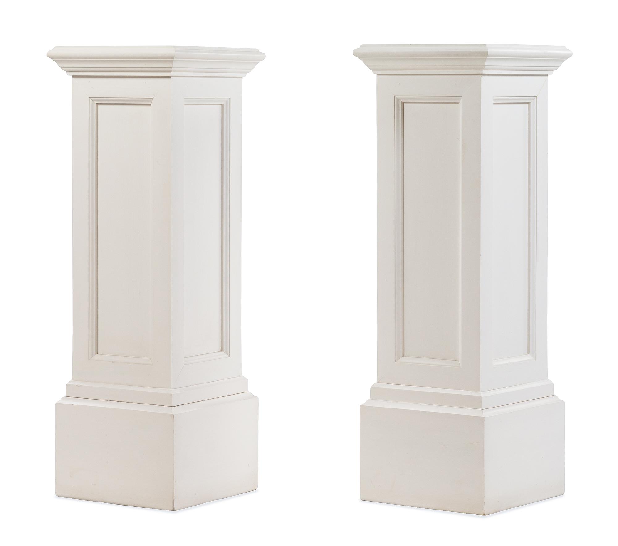 A Pair of White Painted Pedestals Height 39 1/4 x width 13 3/4 x depth 13 3/4 inches. — 20TH CENTURY
