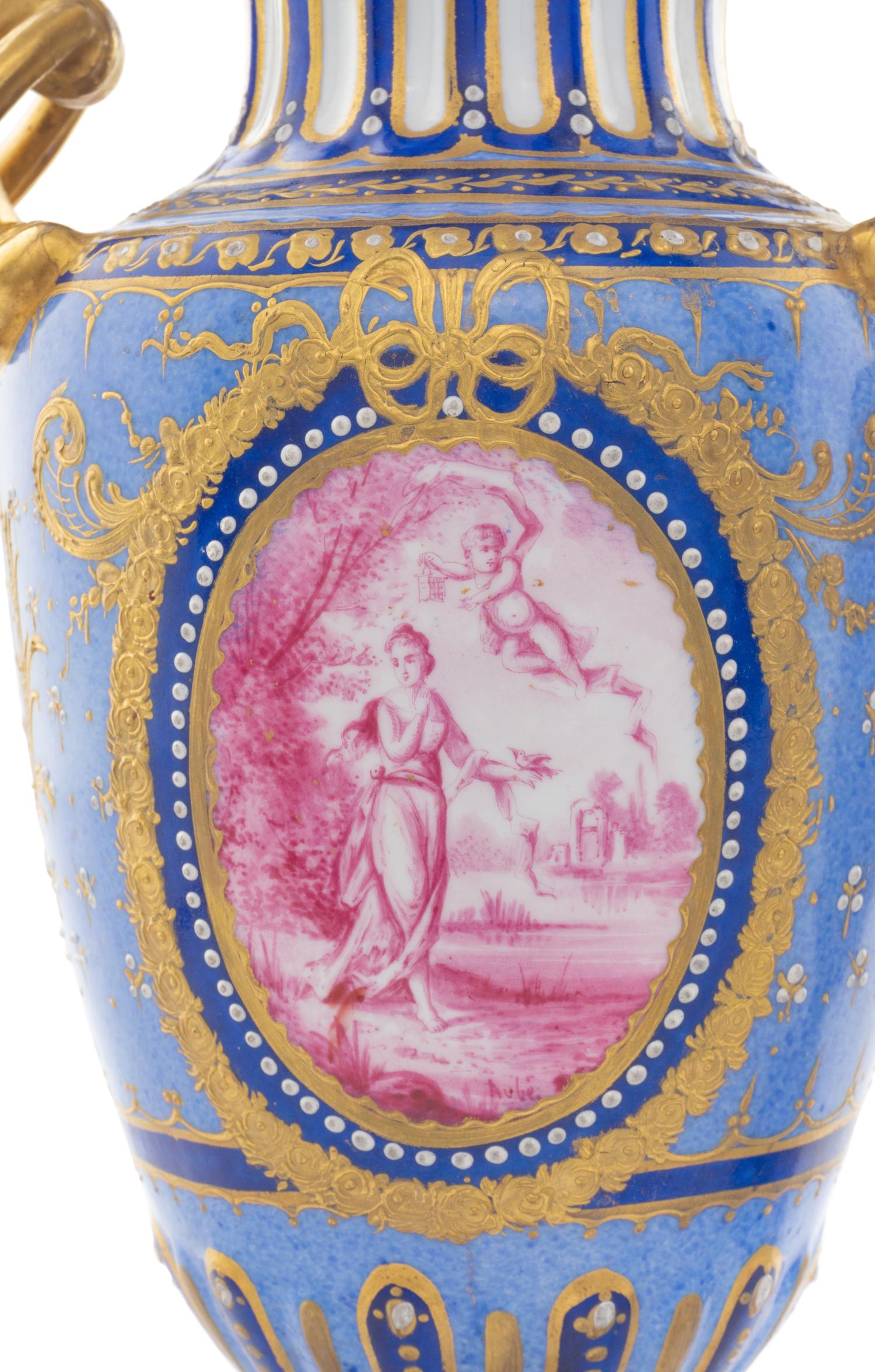 A Pair of Sèvres Porcelain Covered Urns