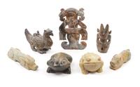 A Group of Seven Archaistic Carved Hardstone Articles Length of largest 10 3/4 x width 7 inches.