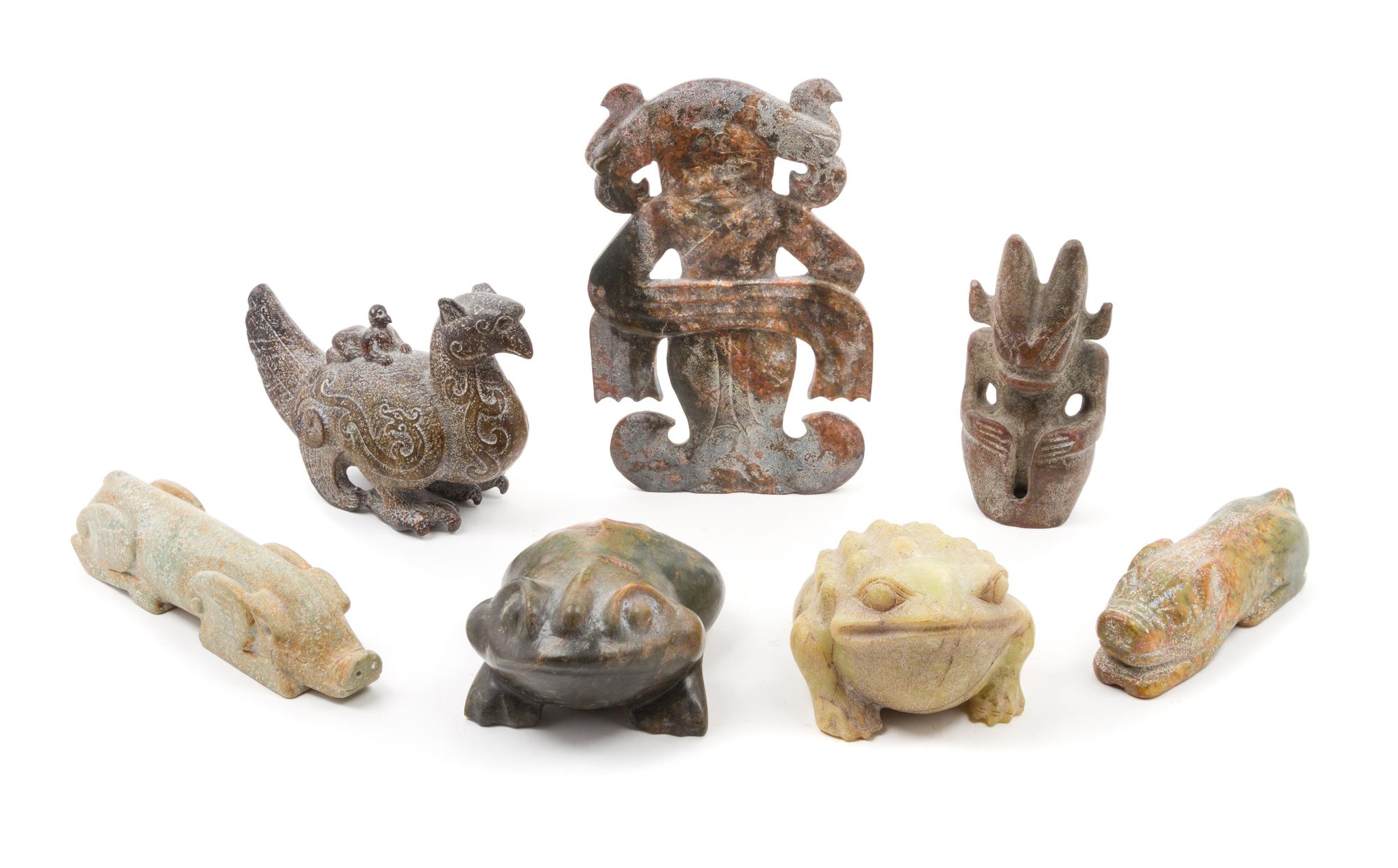 A Group of Seven Archaistic Carved Hardstone Articles Length of largest 10 3/4 x width 7 inches.
