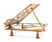 A Continental Brass Book Stand