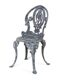 A Set of Four Wrought Iron Chairs