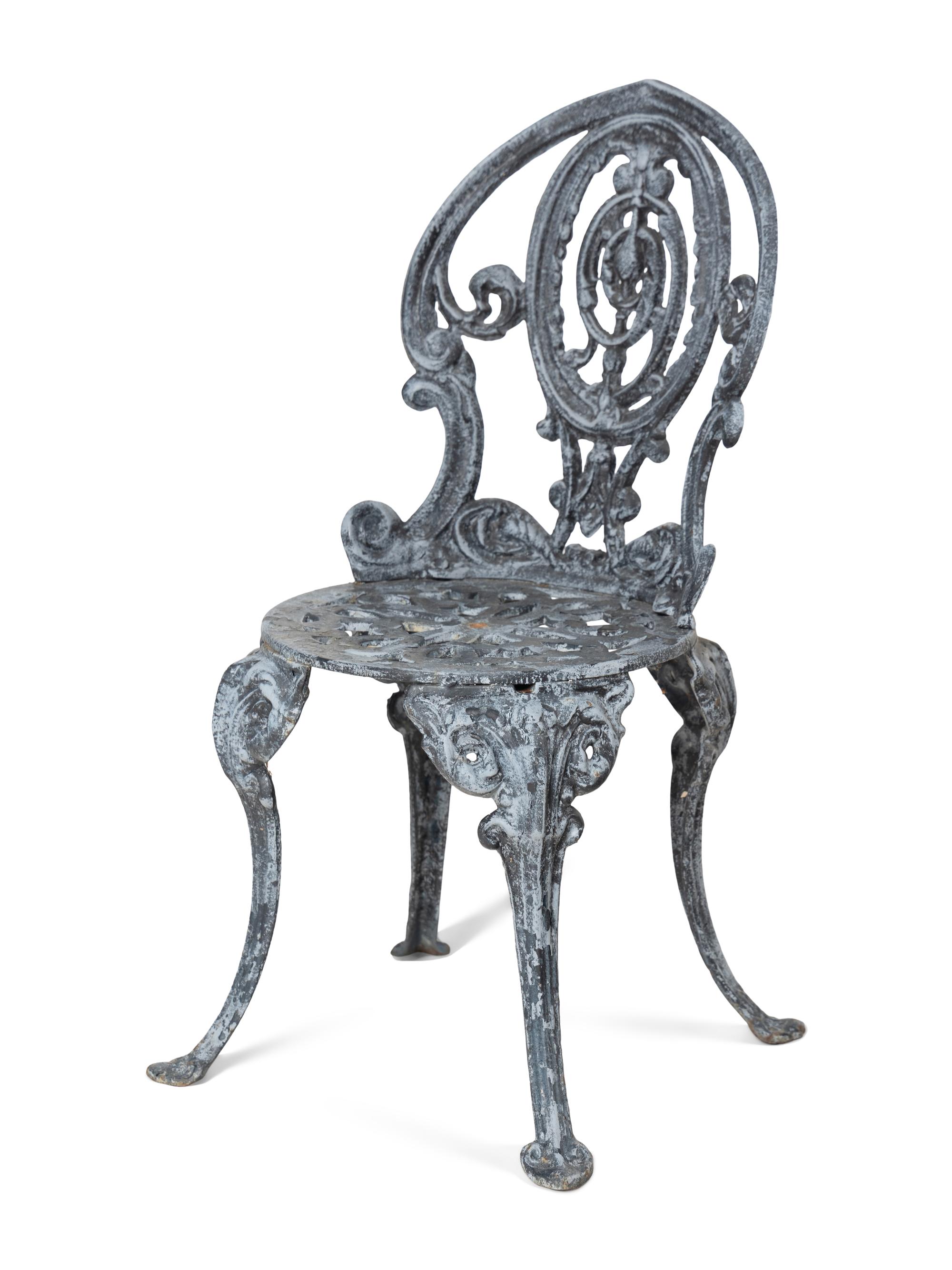 A Set of Four Wrought Iron Chairs