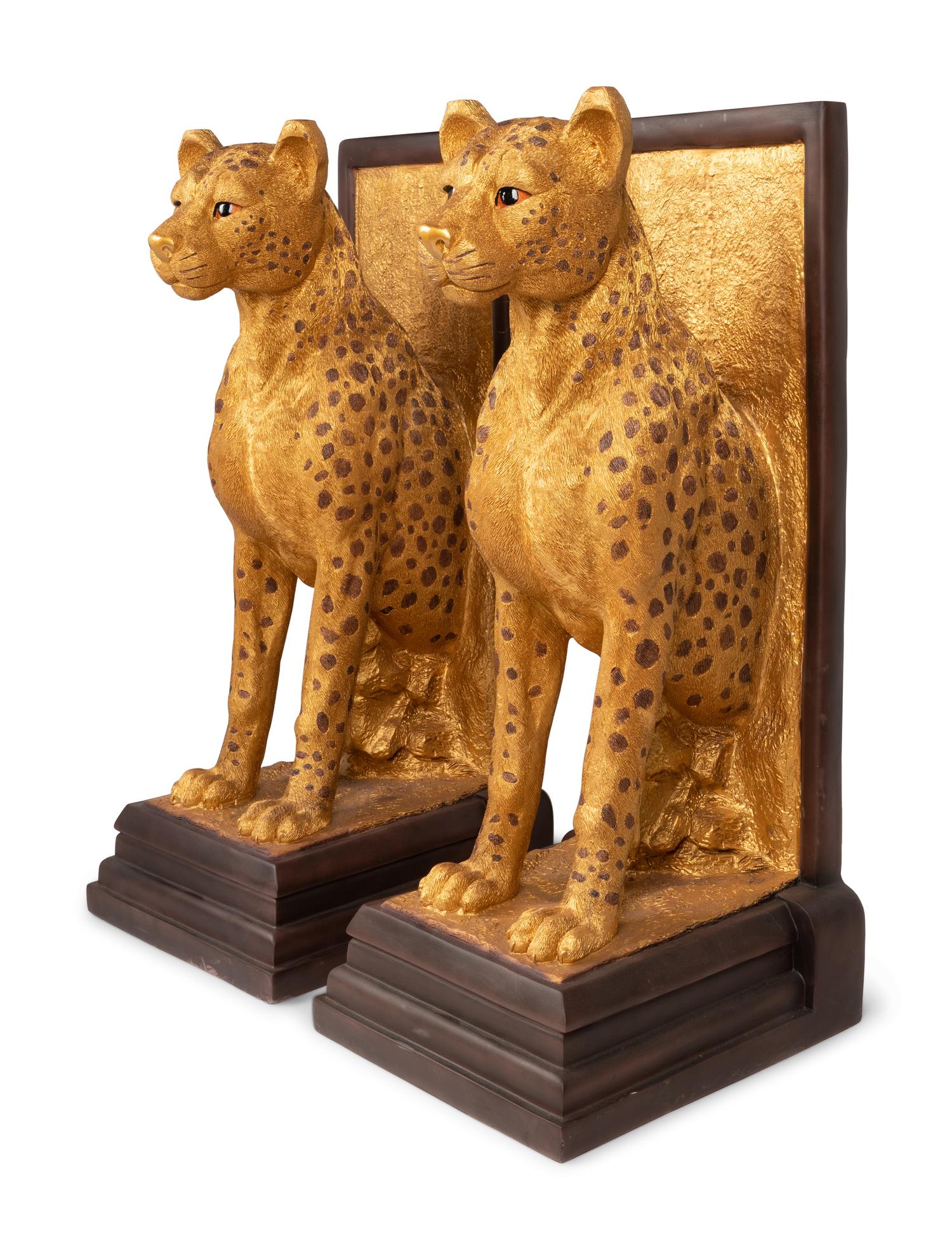 A Pair of Gilt Decorated Resin Cheetah Figures
