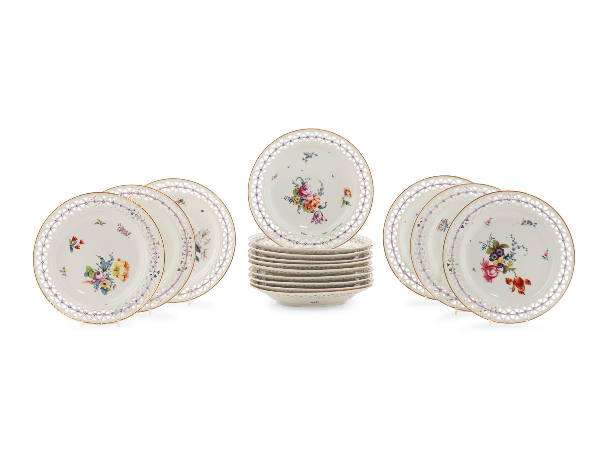 A Set of Sixteen Herend Porcelain Reticulated Dessert Plates