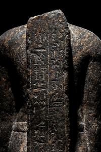 An Egyptian Granite Torso of an Official