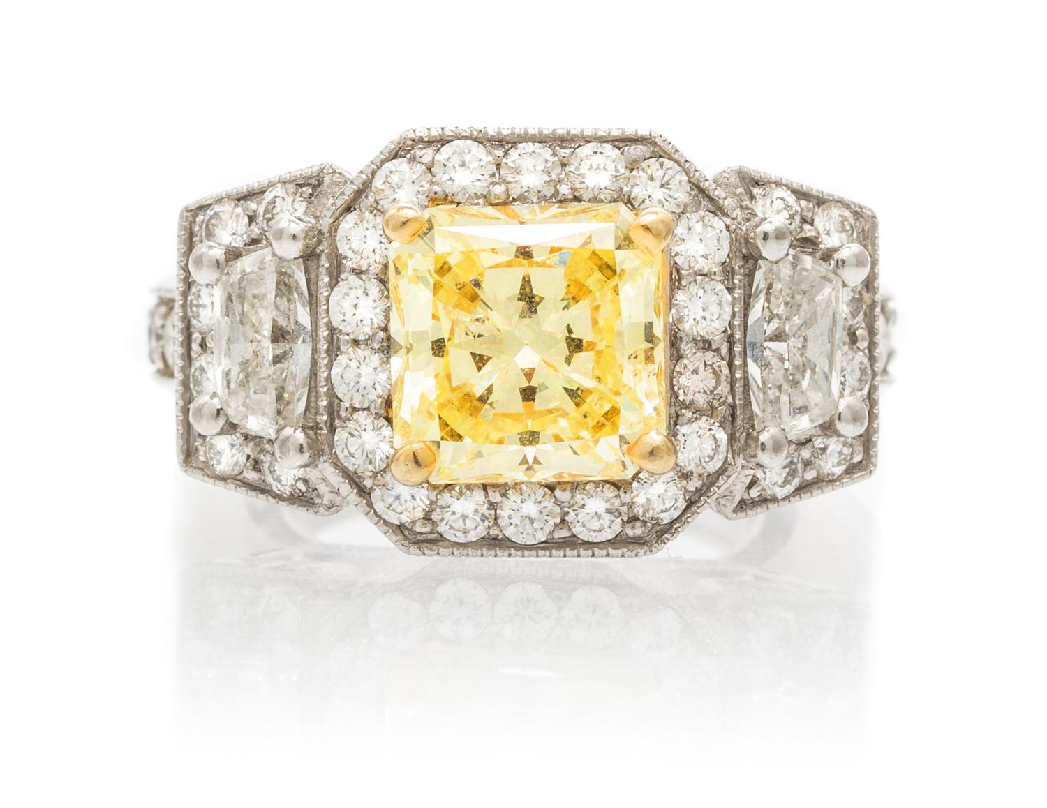A Platinum, Yellow Gold, Colored Diamond and Diamond Ring, 11.70 dwts.