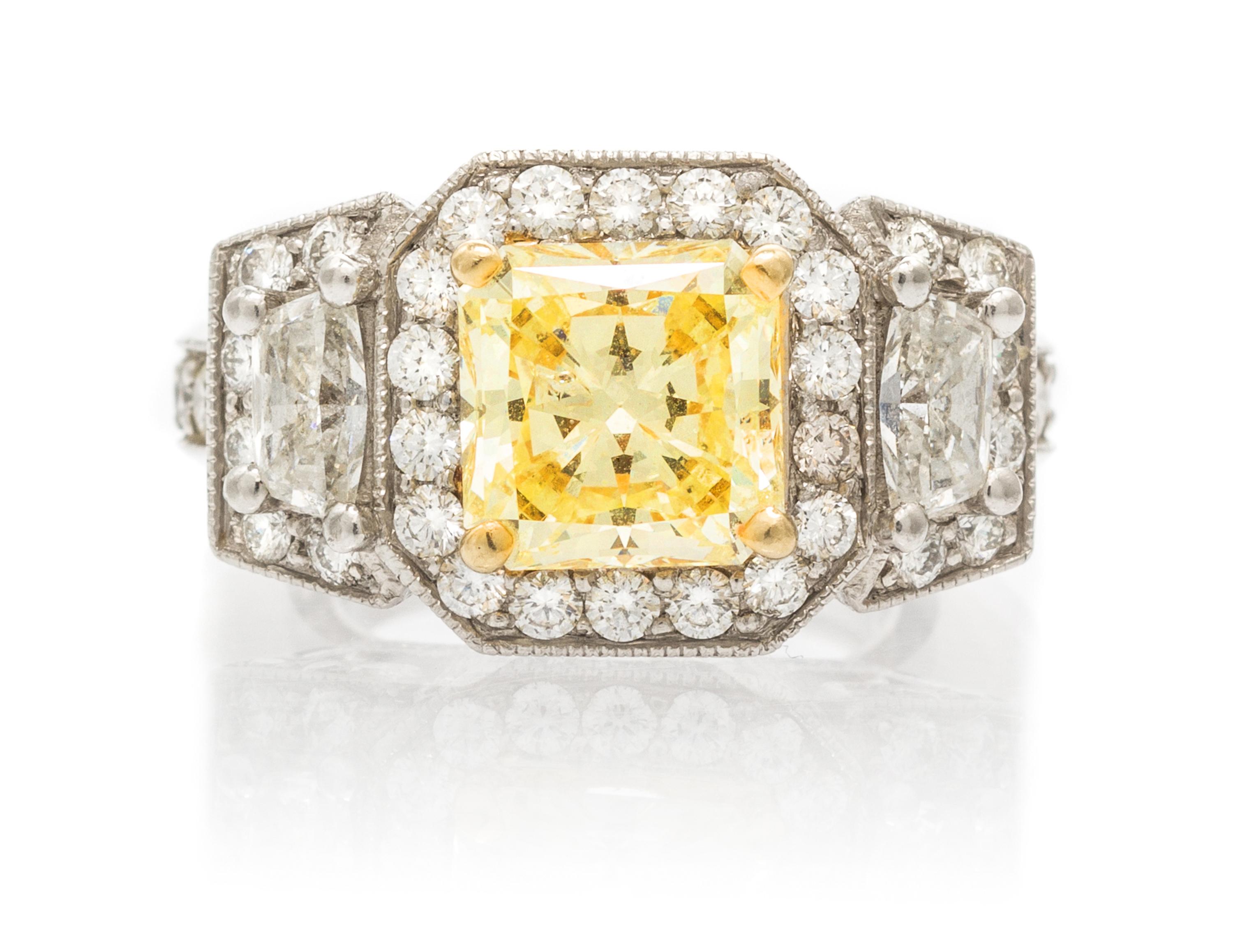 A Platinum, Yellow Gold, Colored Diamond and Diamond Ring, 11.70 dwts.