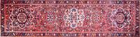 A Heriz Runner. 4 feet x 13 feet 6 inches.