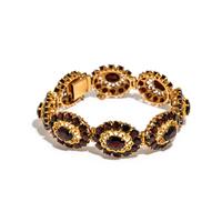 A COLLECTION OF YELLOW GOLD AND GARNET JEWELRY