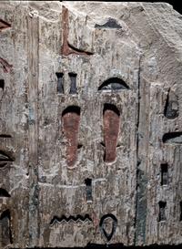 An Egyptian Polychrome Limestone Relief Fragment
