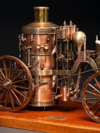 A Copper and Wood Horse-Drawn Steam-Powered Fire Engine Model