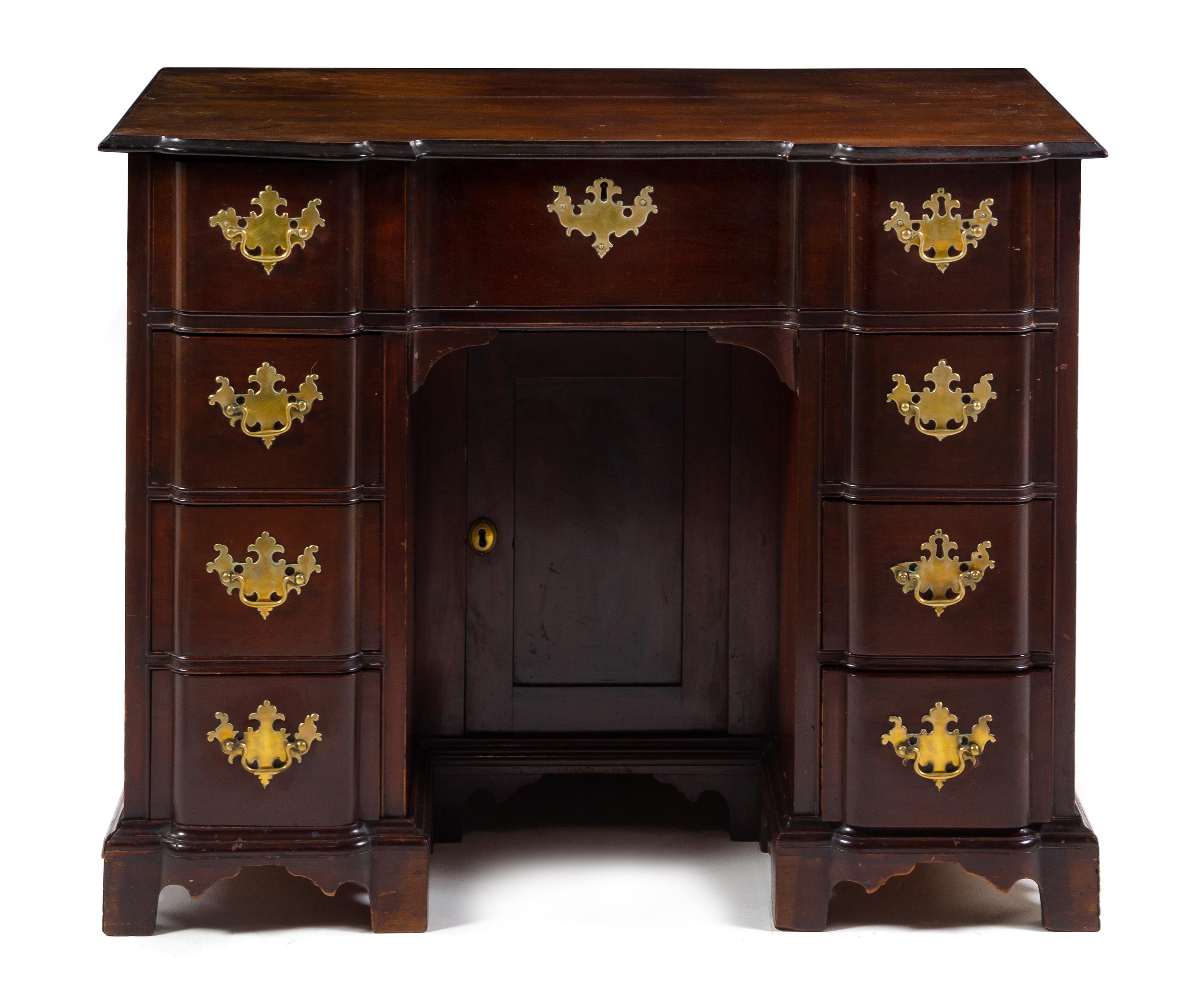 A Chippendale Mahogany Kneehole Desk Height 31 3/4 x width 40 x depth 21 1/2 inches. — BOSTON, MASSACHUSETTS, CIRCA 1750