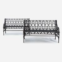 A pair of Gothic Revival black-painted cast iron garden benches 20th century
