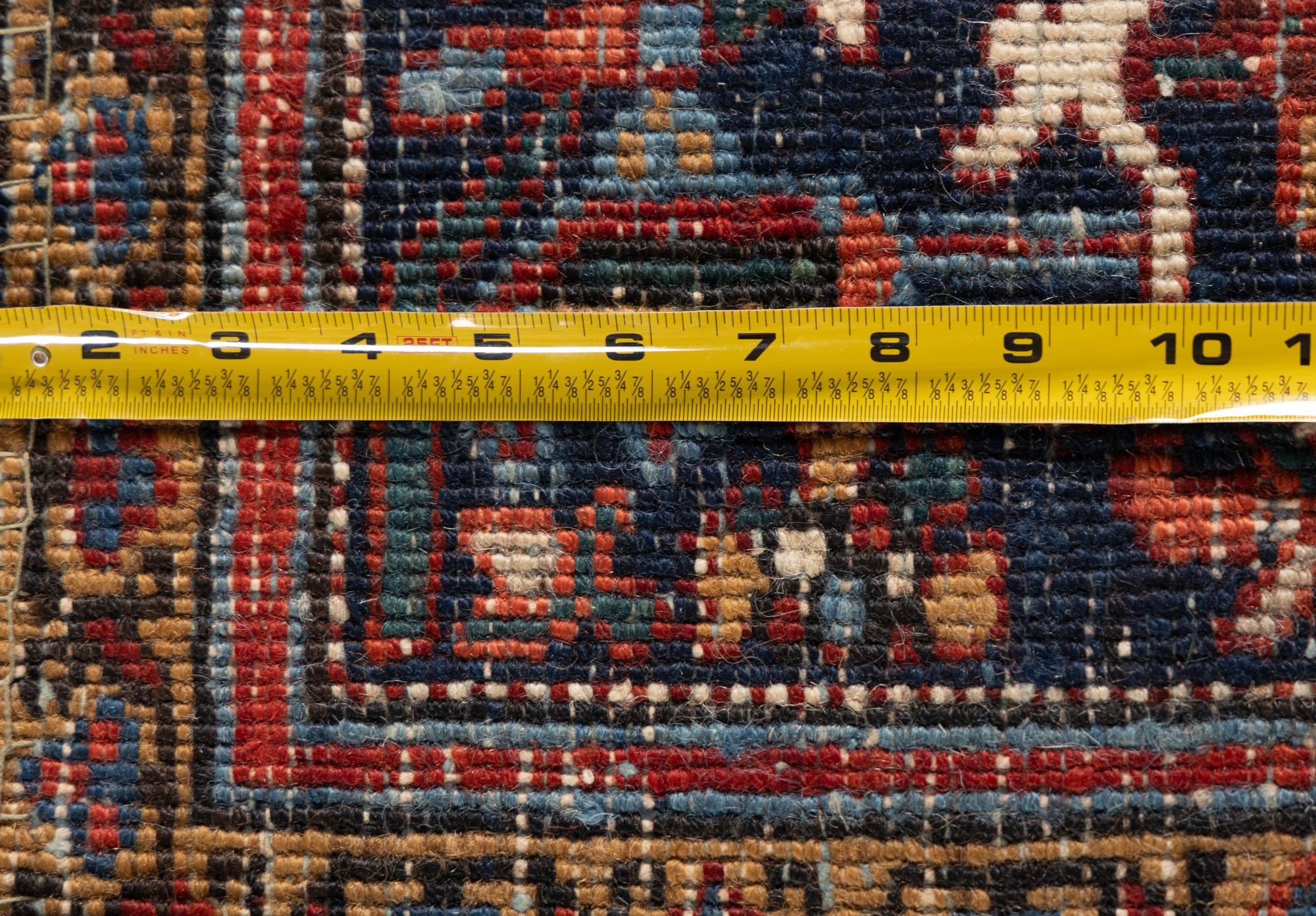 A Heriz Wool Rug