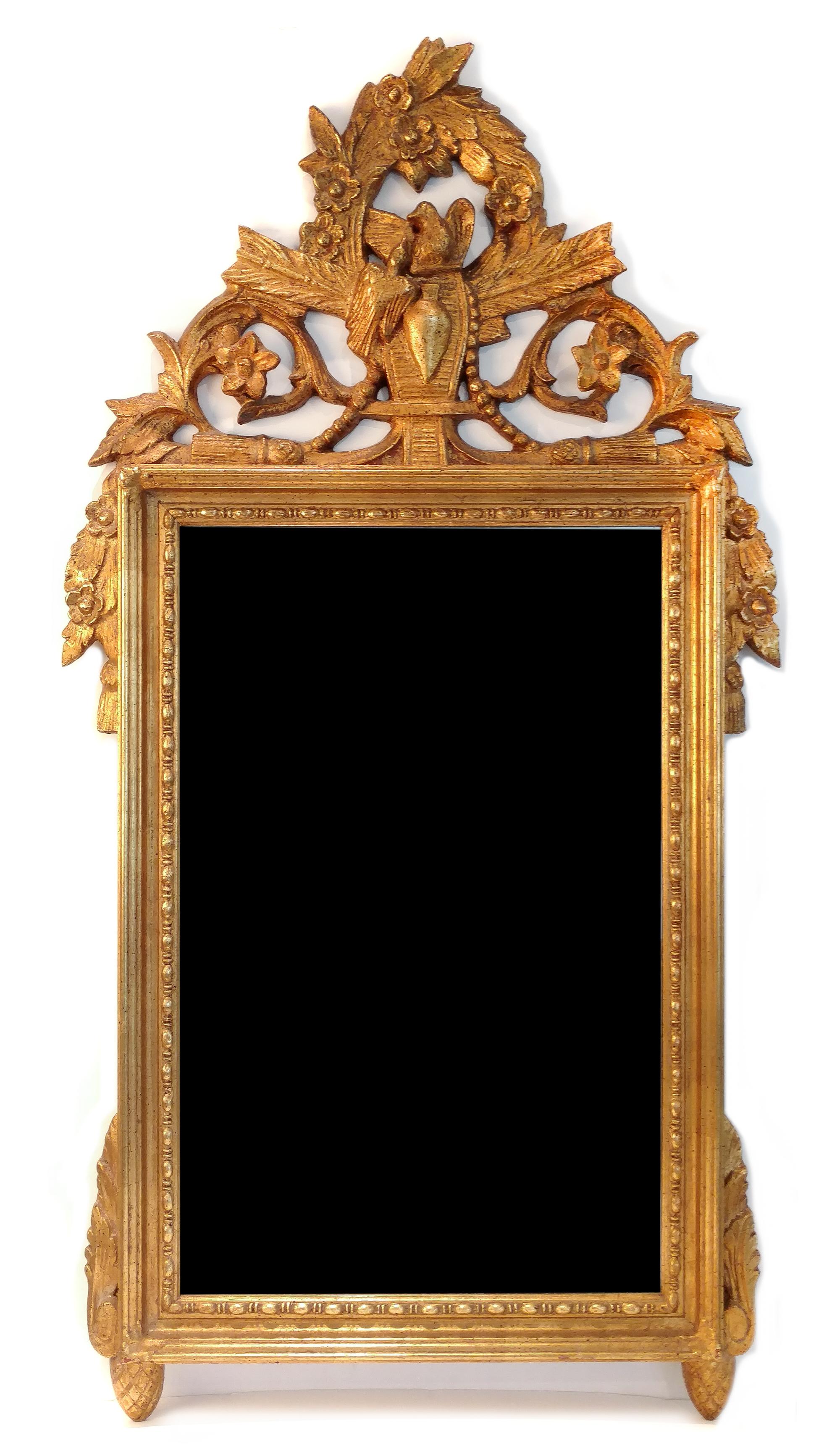 A Louis XVI Style Giltwood Mirror Height 37 x width 20 1/2 inches.