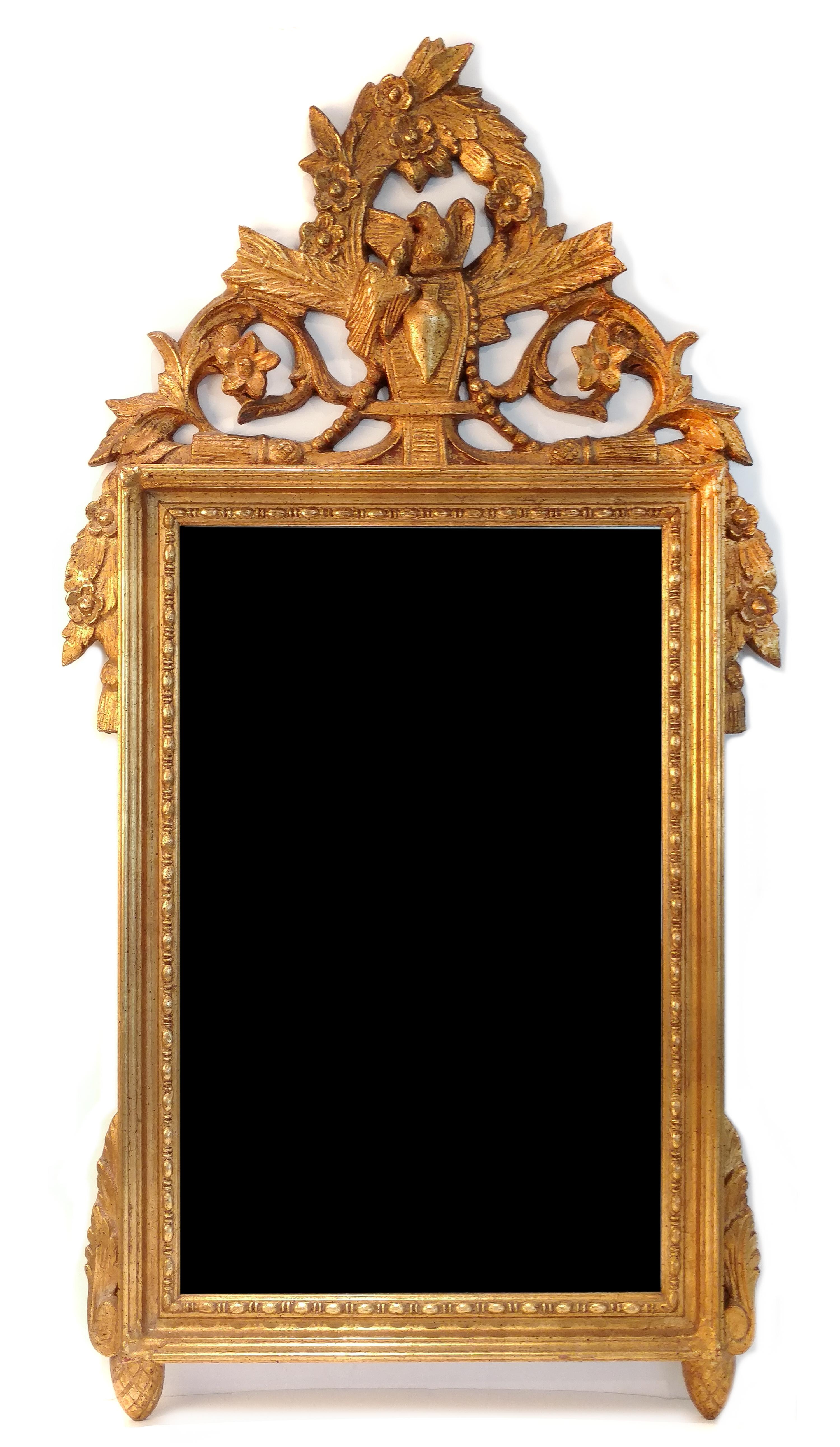 A Louis XVI Style Giltwood Mirror Height 37 x width 20 1/2 inches.