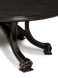A Therien Studios Ebonized Walnut Volute Circular Extension Dining Table
