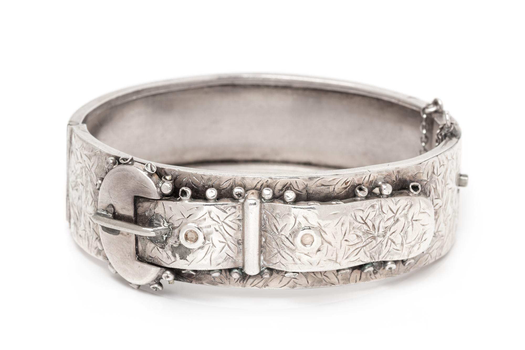 An Antique Sterling Silver Buckle Motif Bangle Bracelet, 23.10 dwts.