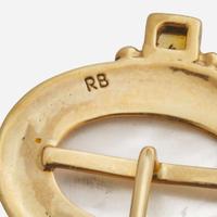 A Collection of Three 14K Yellow Gold Pins