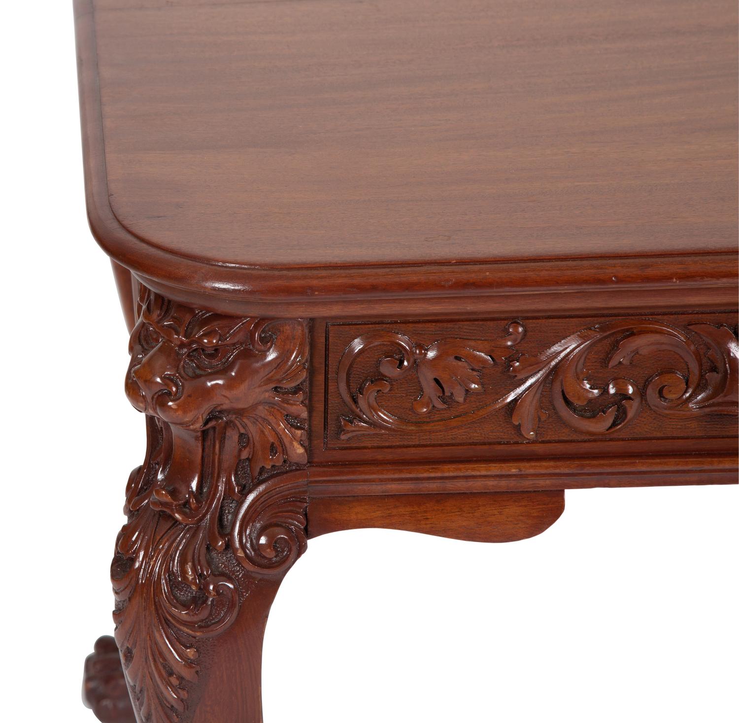 A Georgian Style Carved Mahogany Writing Table