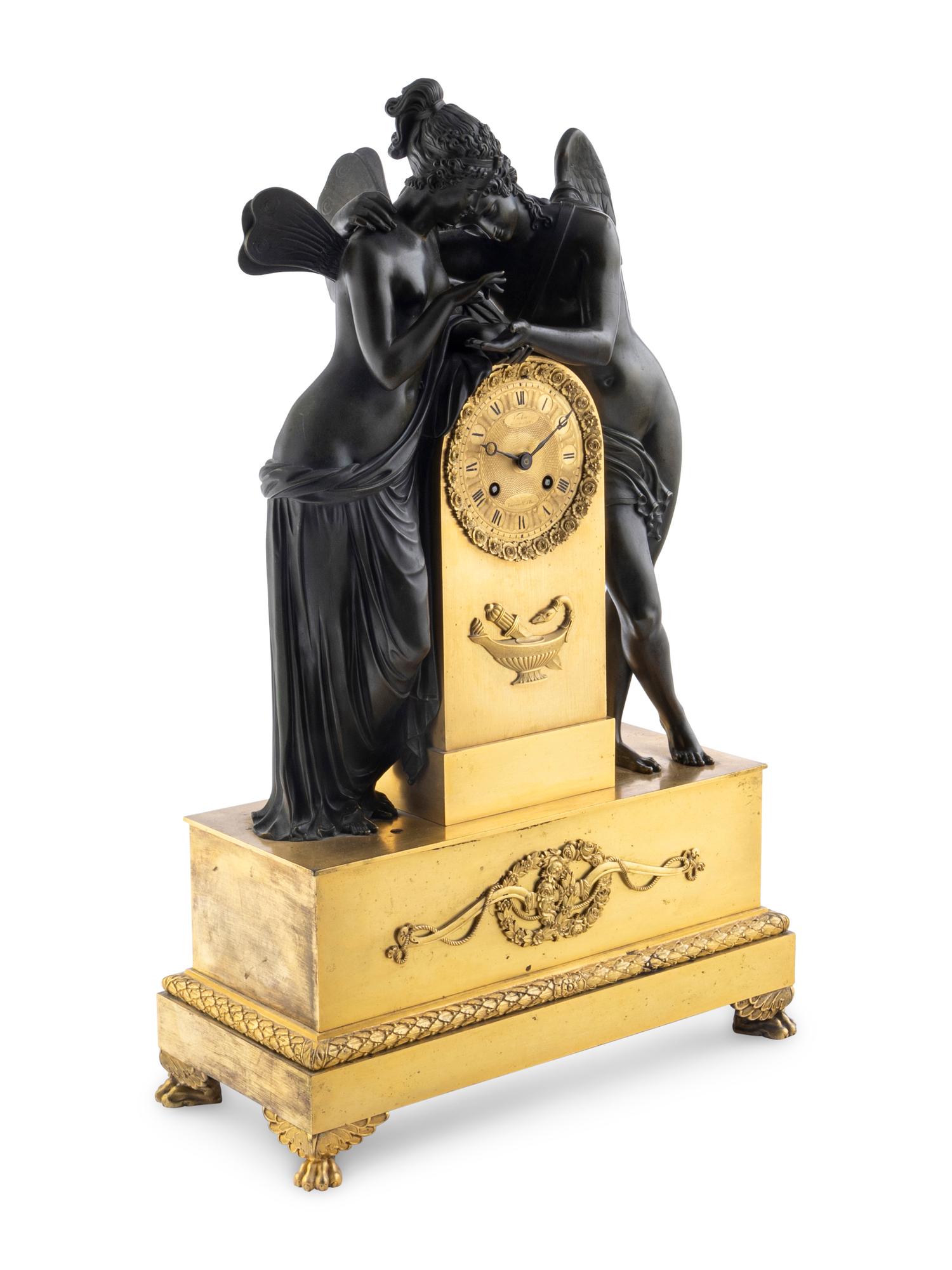An Empire Bronze Clock Depicting Cupid and Psyche