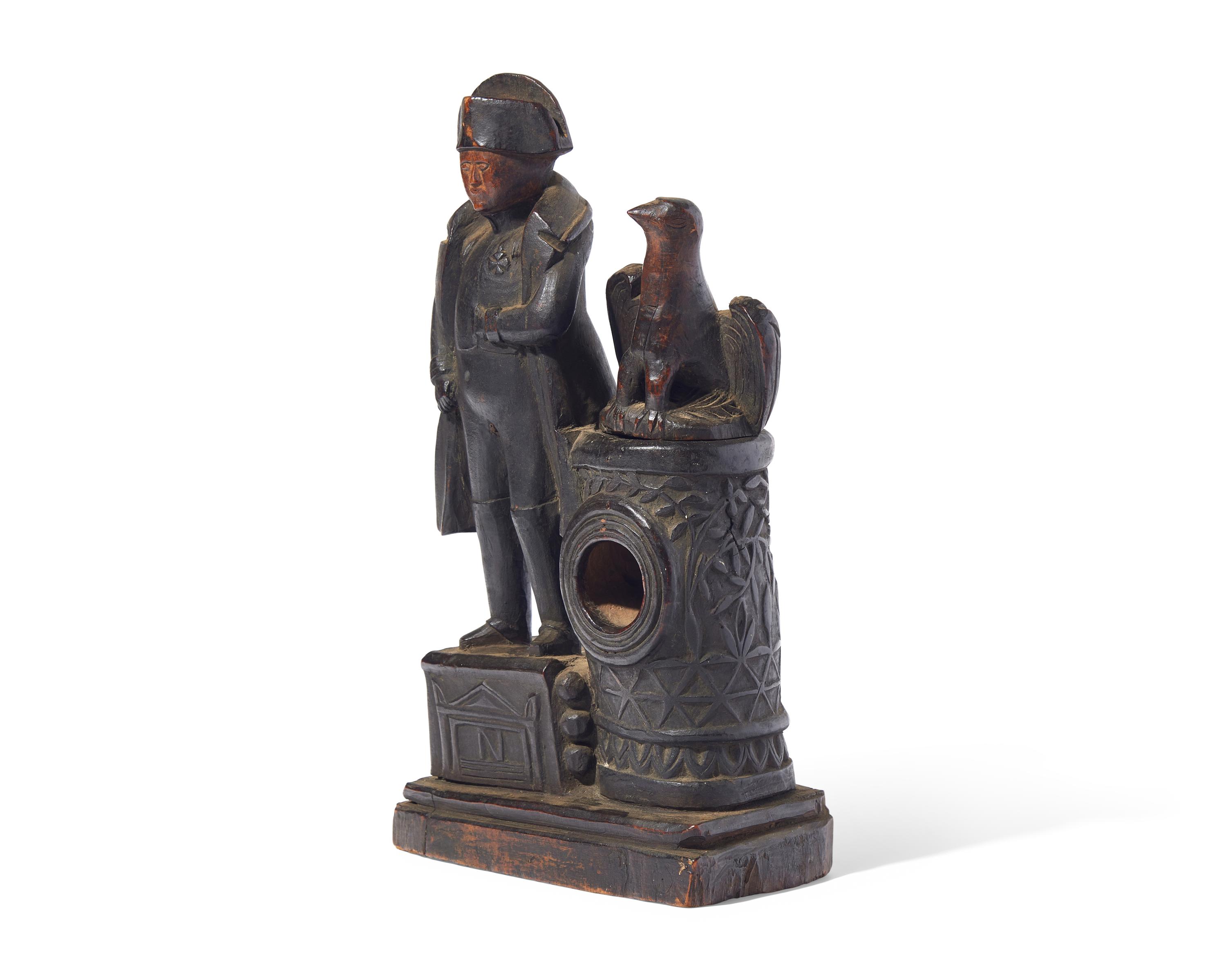 A Carved Wood Watch Hutch in the Form of Napoleon with Eagle