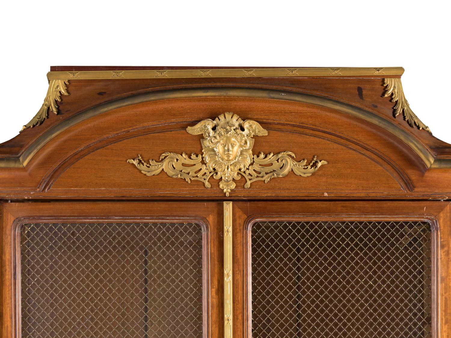 A Louis XV Style Gilt Bronze Mounted Mahogany Vitrine Cabinet
