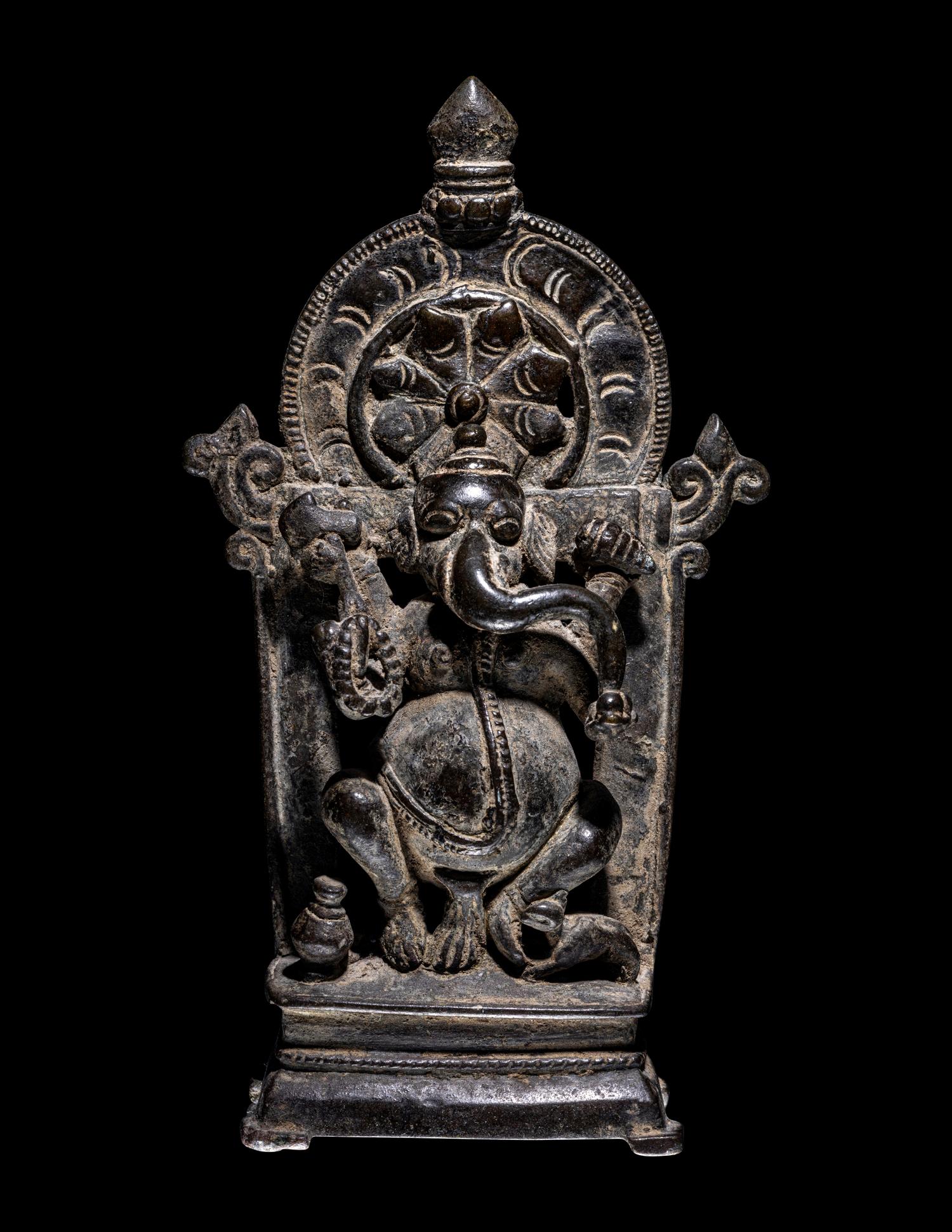 An Indian Bronze Ganesha, Enthroned