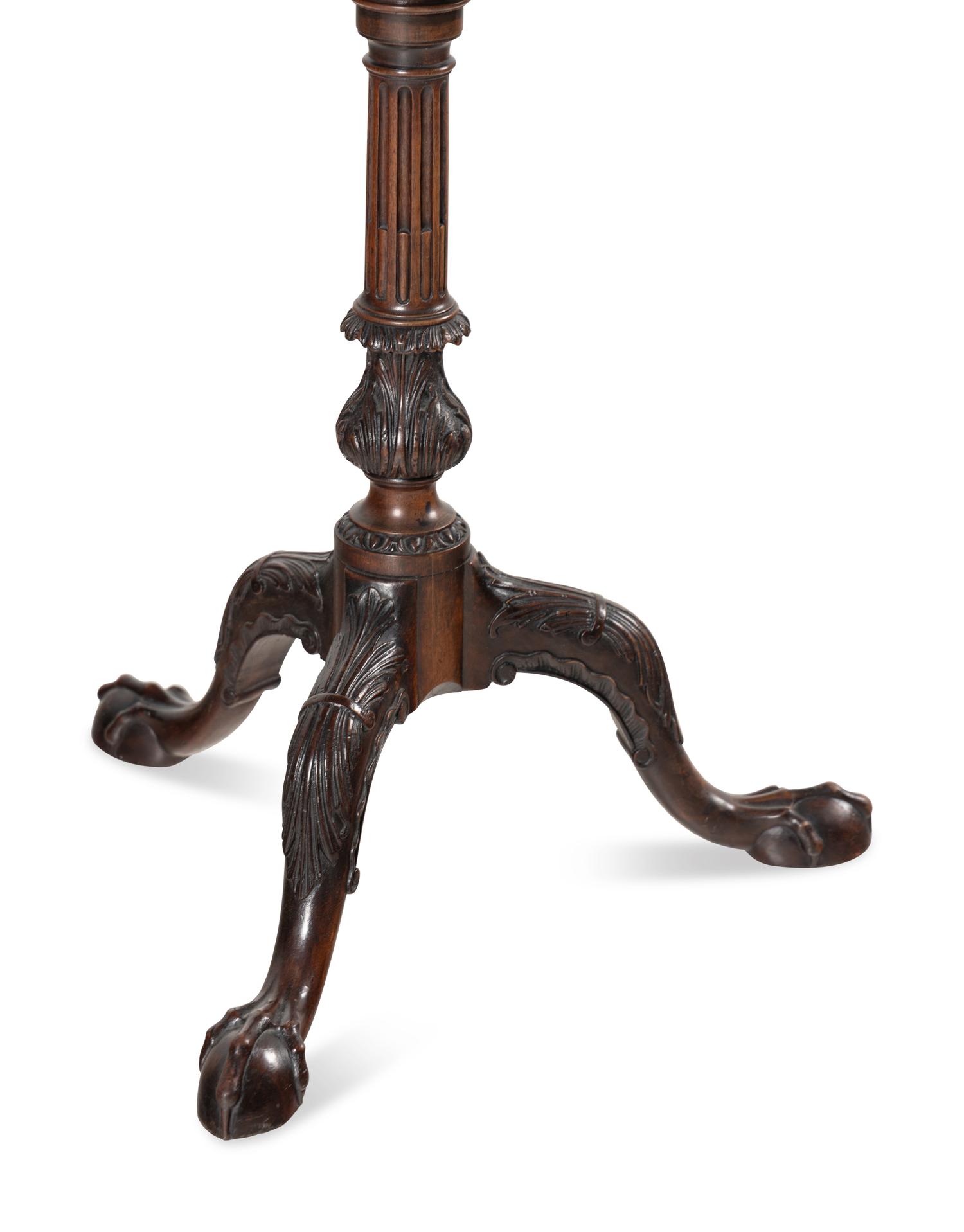 A George III Carved Mahogany Tilt-Top Tea Table