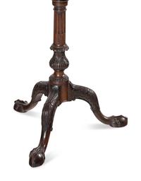 A George III Carved Mahogany Tilt-Top Tea Table