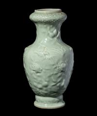 A Chinese Molded Celadon Glazed Porcelain Vase
