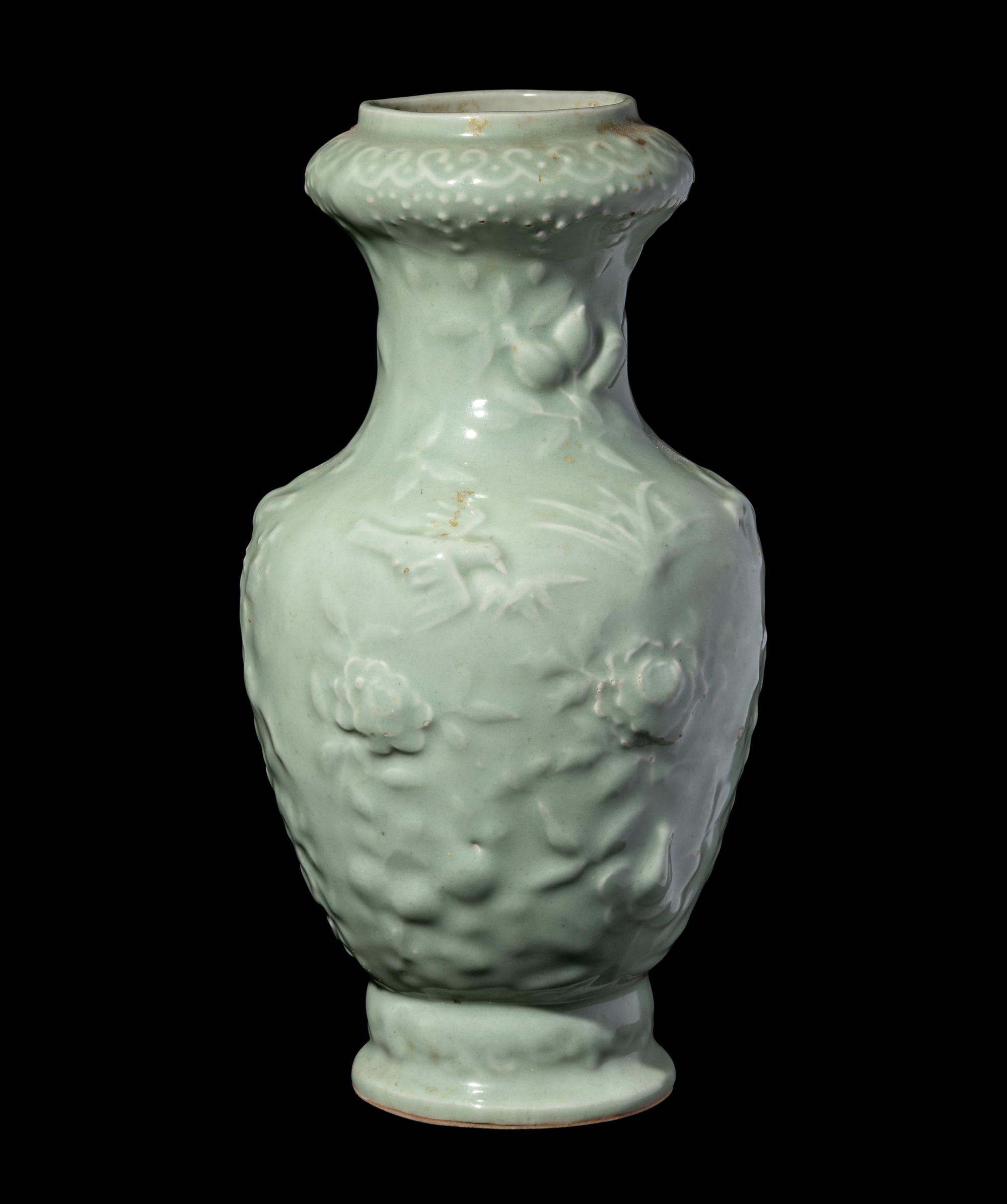 A Chinese Molded Celadon Glazed Porcelain Vase