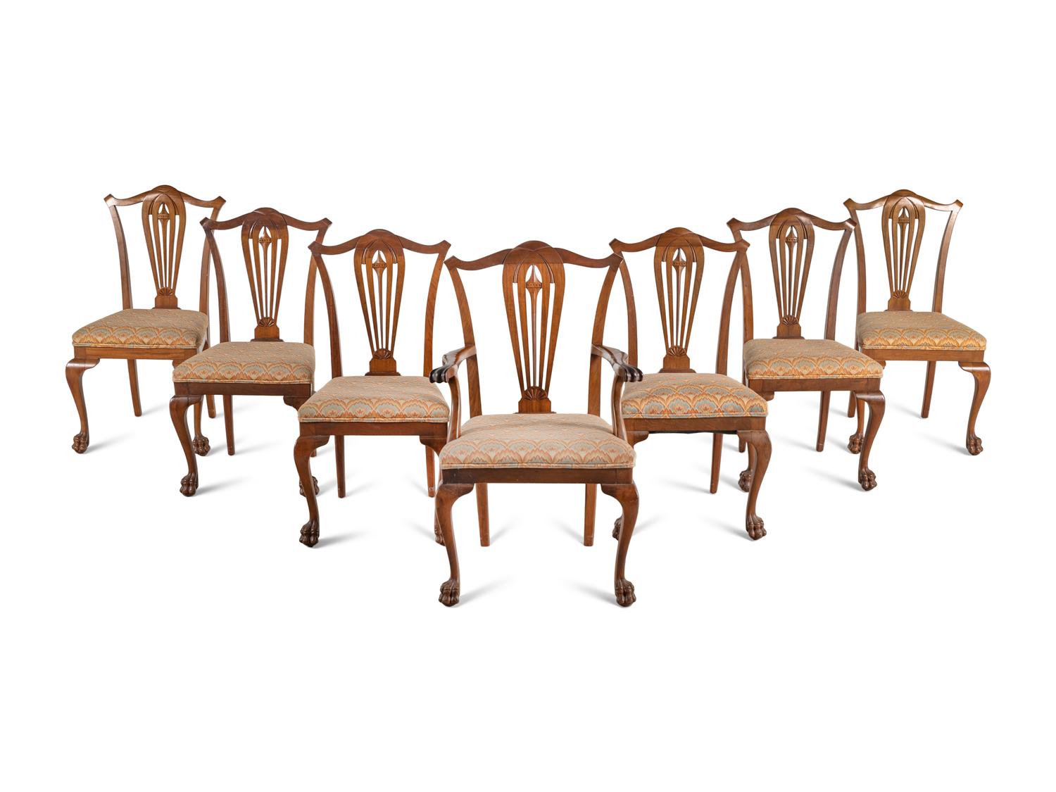 A Set of Seven George III Style Walnut Dining Chairs