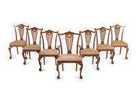 A Set of Seven George III Style Walnut Dining Chairs