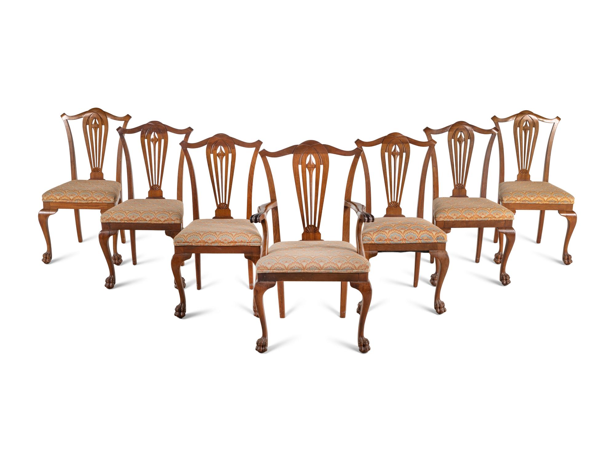 A Set of Seven George III Style Walnut Dining Chairs