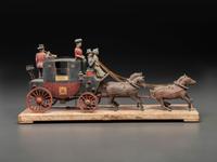 A Folk Art Carved and Painted Wood English Royal Stagecoach