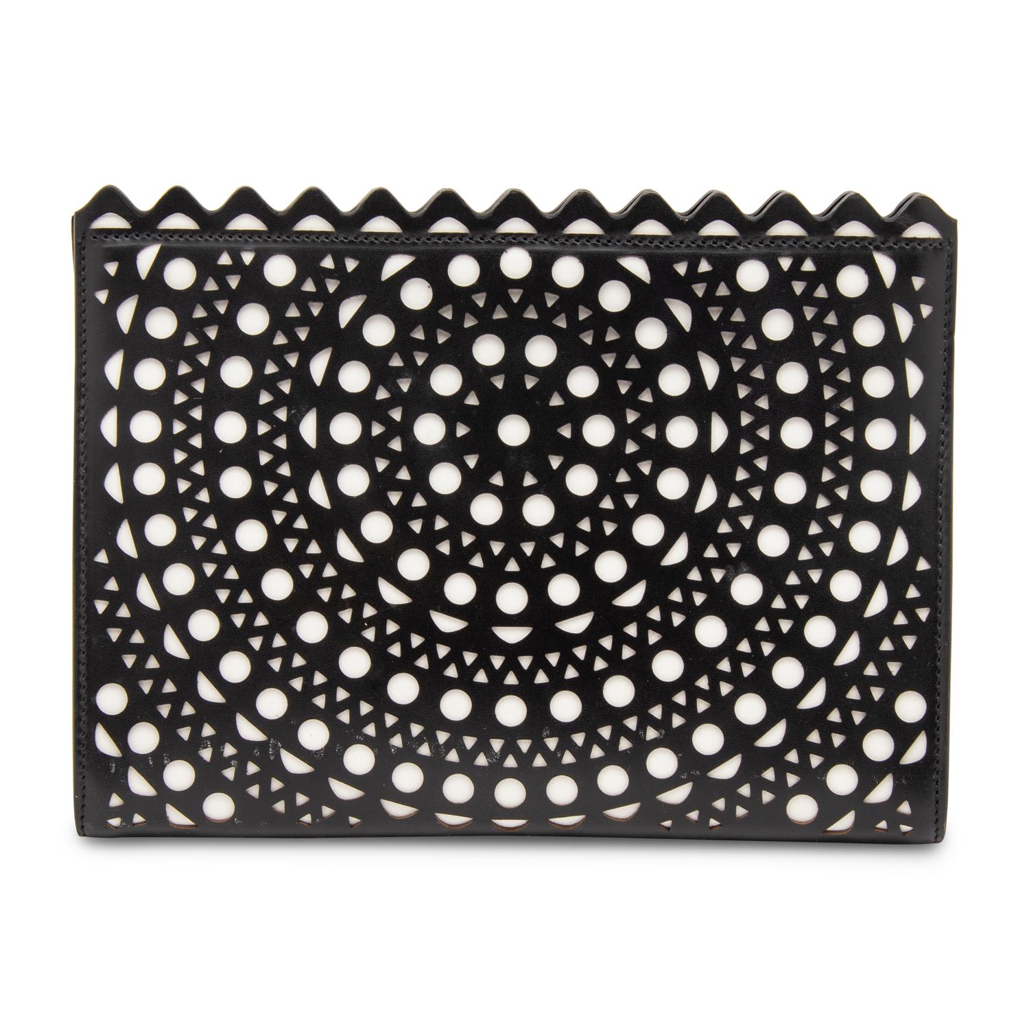 ALAÏA, LASER-CUT LEATHER CLUTCH