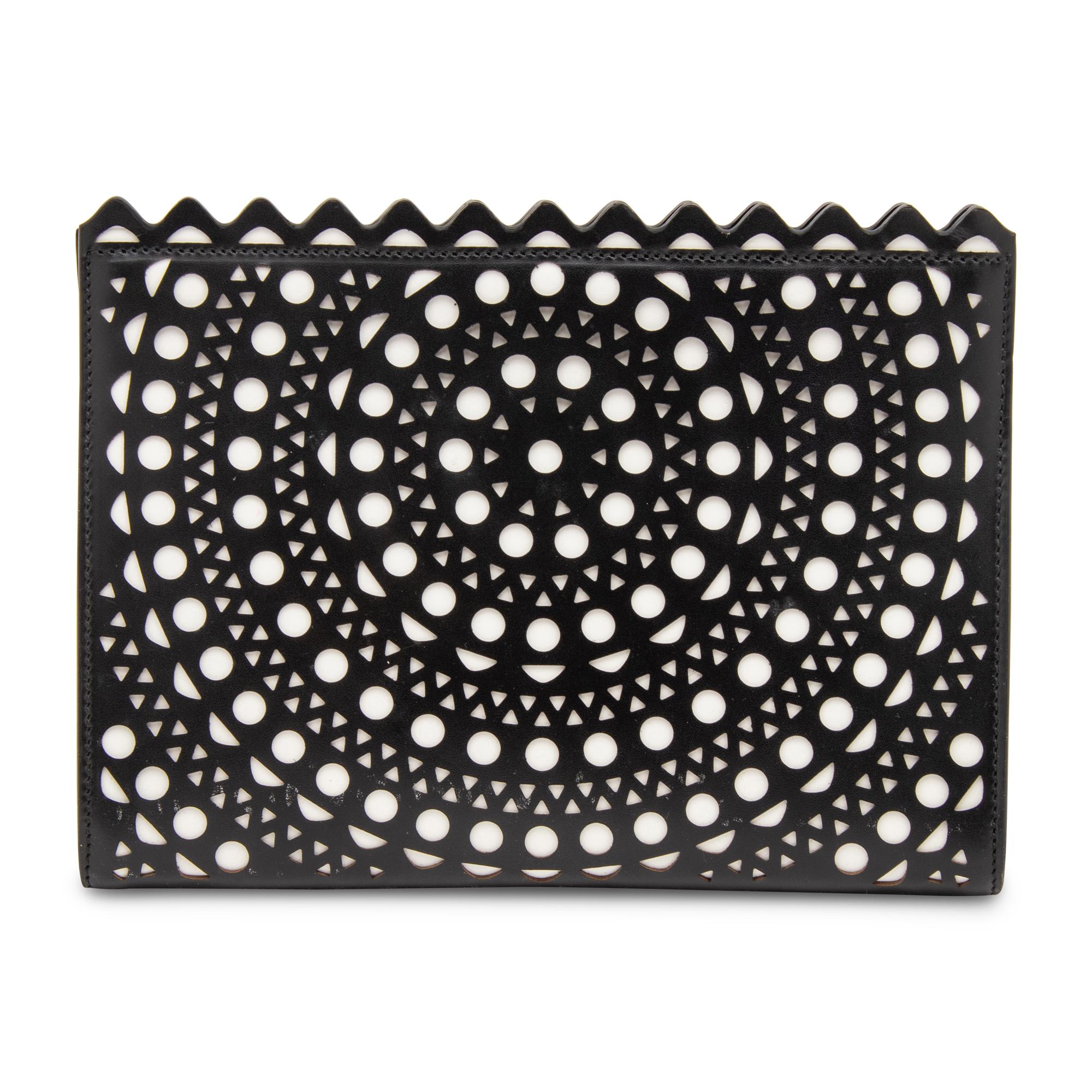 ALAÏA, LASER-CUT LEATHER CLUTCH