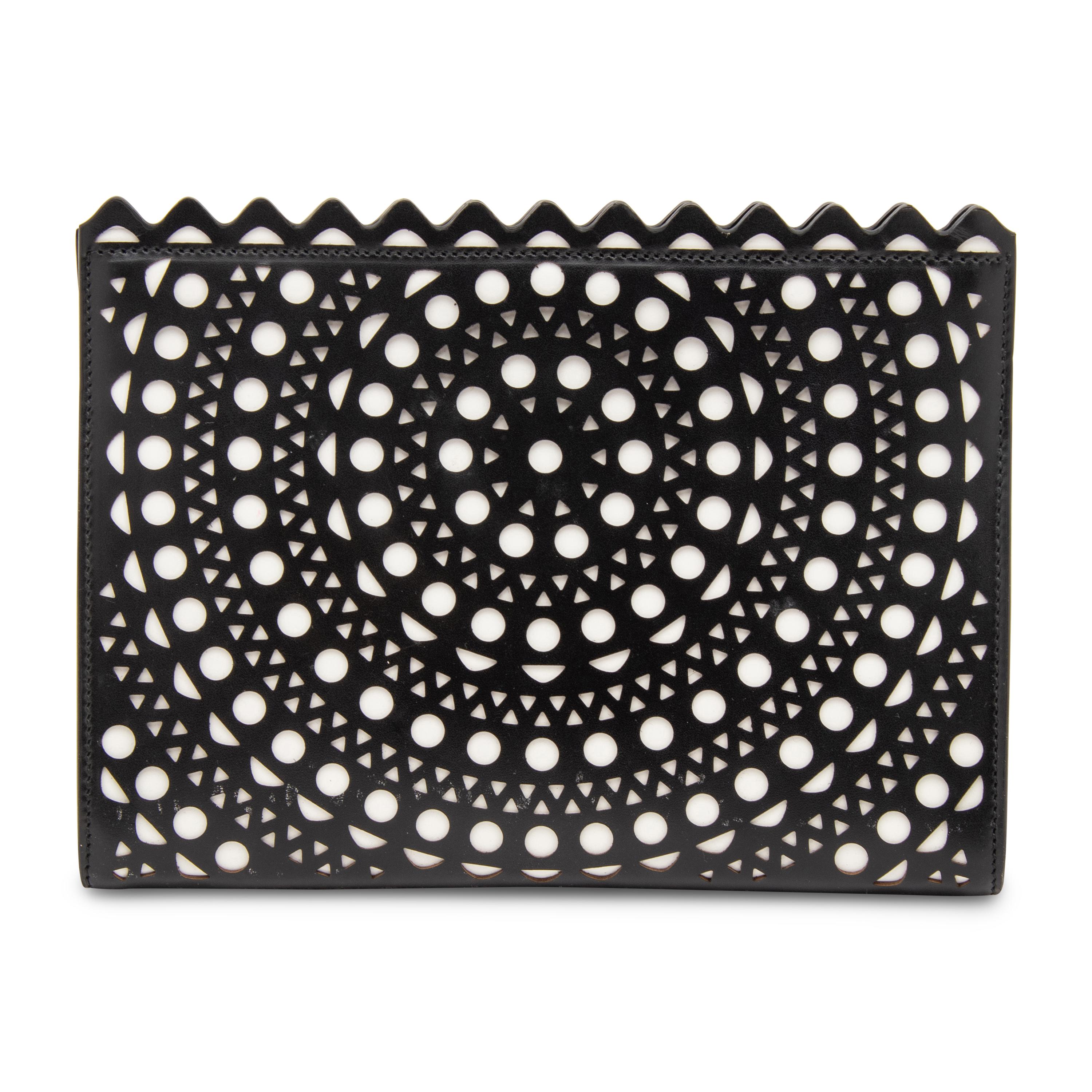 ALAÏA, LASER-CUT LEATHER CLUTCH
