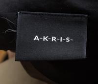An Akris Cream and Black Skirt Ensemble, Top size 6; Skirt size 4.