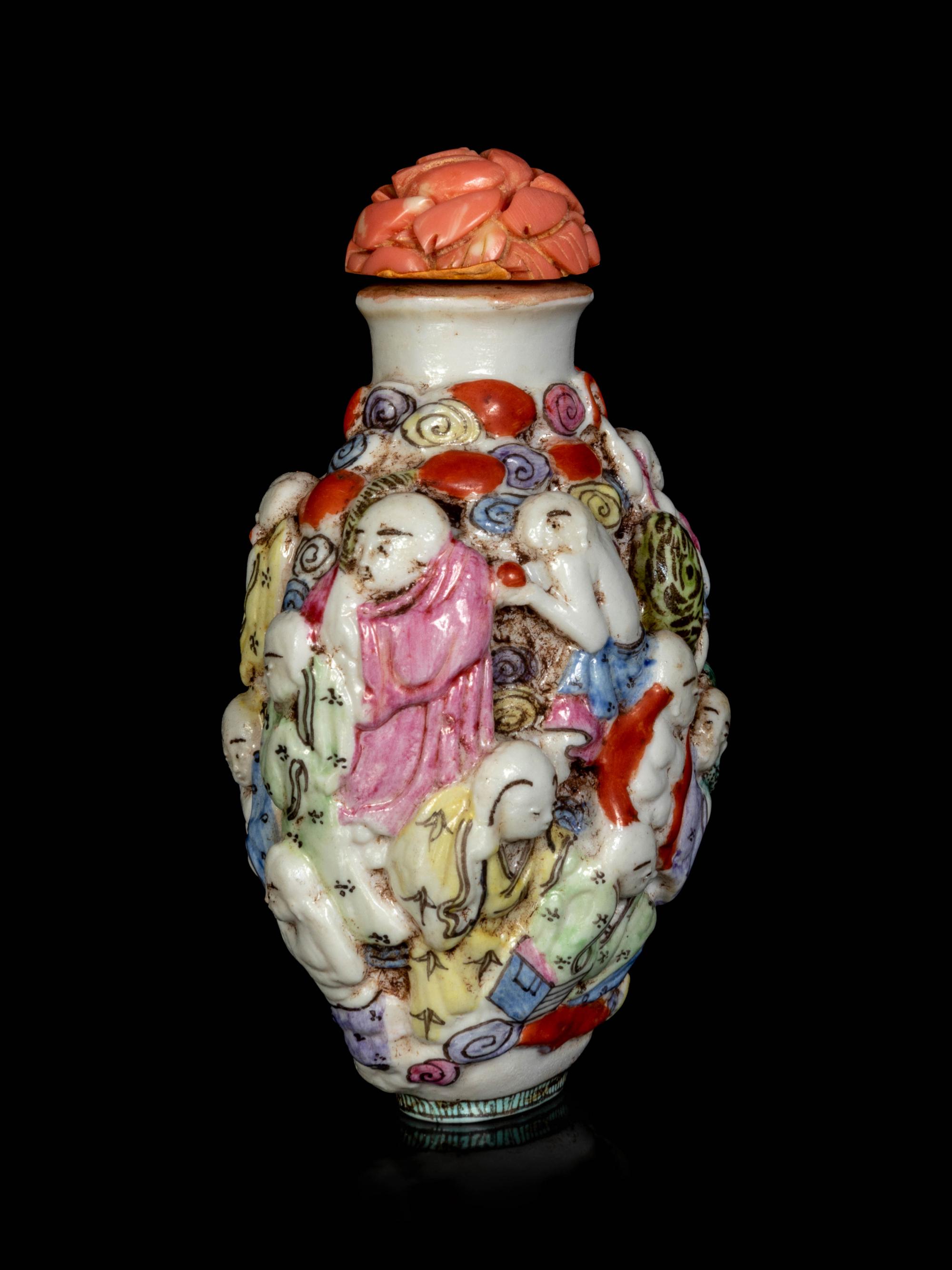A Chinese Molded Famille Rose Porcelain ‘Luohan’ Snuff Bottle