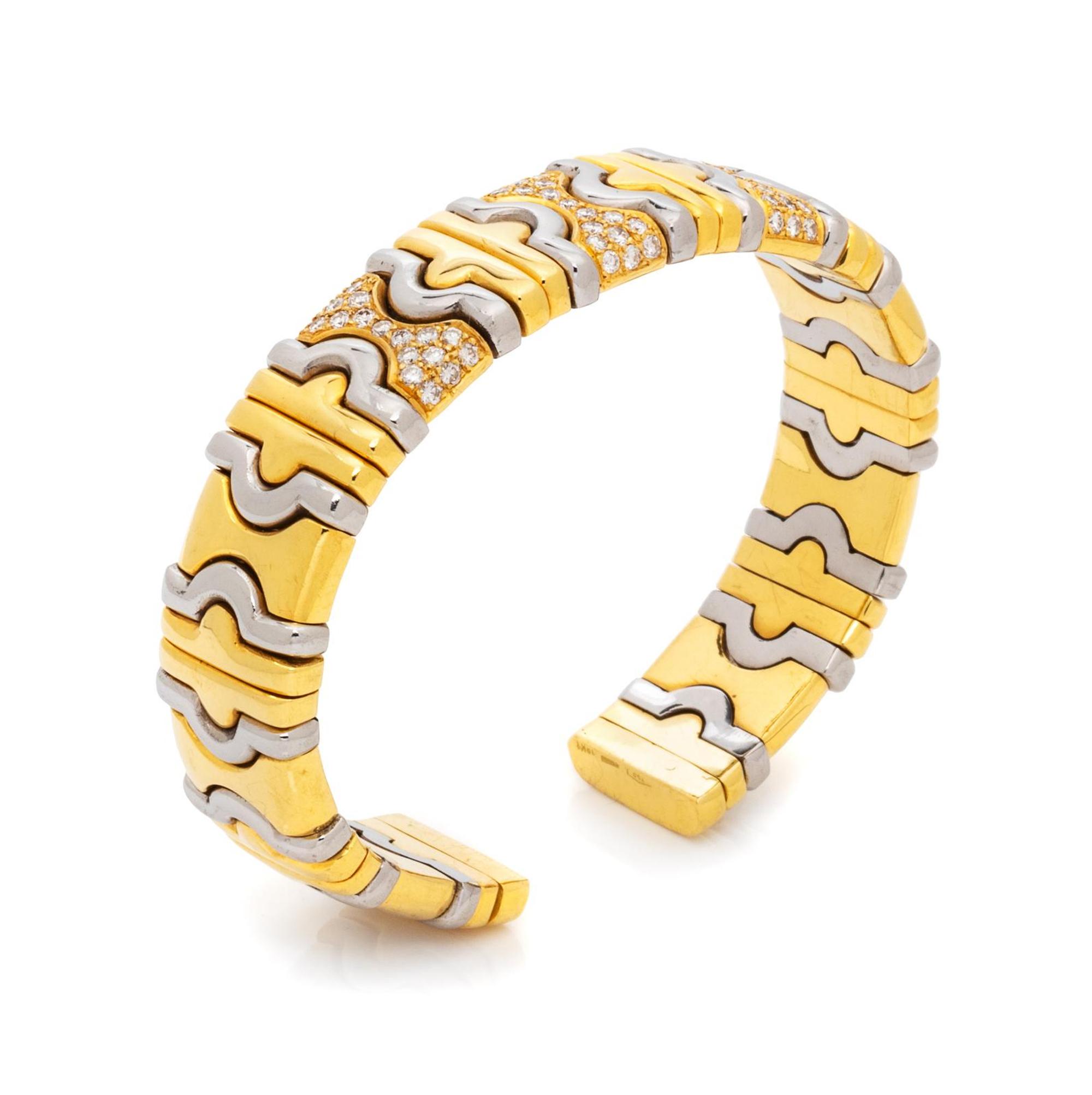 DINO CEVA, YELLOW GOLD, STEEL AND DIAMOND CUFF BRACELET