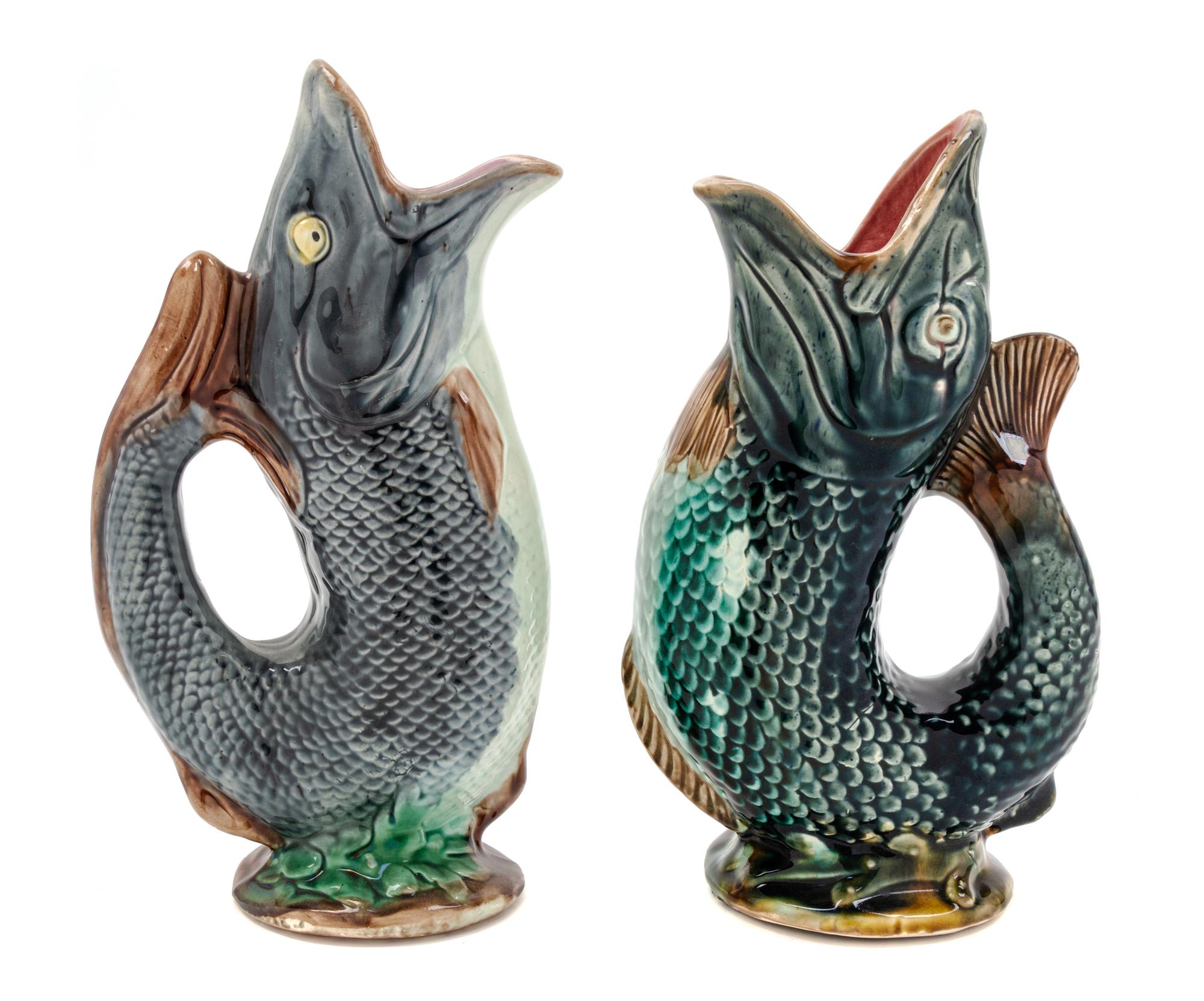 A Near Pair of American Majolica Figural Water Pitchers Height of taller 10 1/4 inches. — GEORGE MORLEY, CIRCA 1880