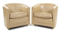 A Pair of Dunbar Barrel-Back Chairs Height 27 inches.